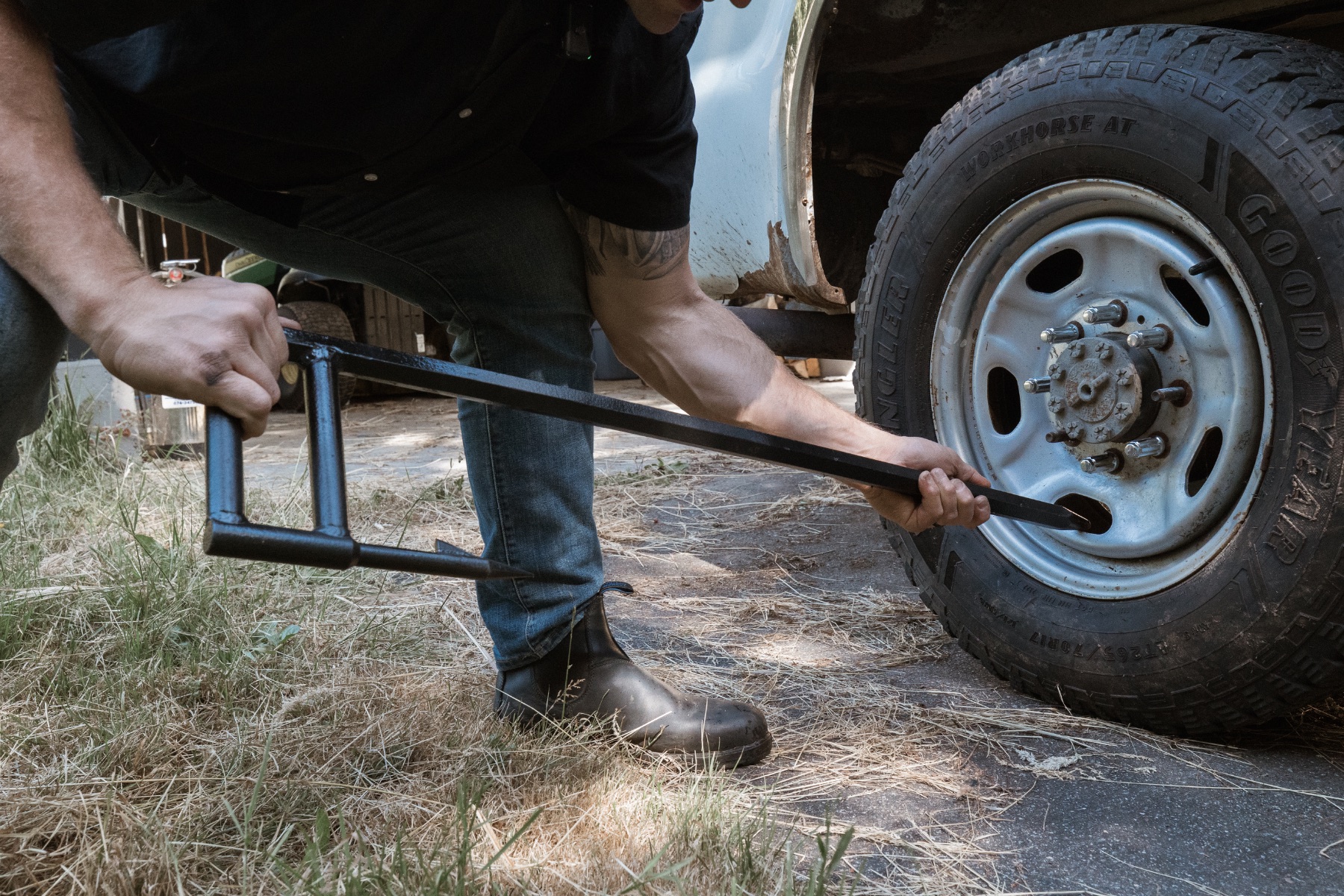 Officer placing Wheel Hooks into the wheels