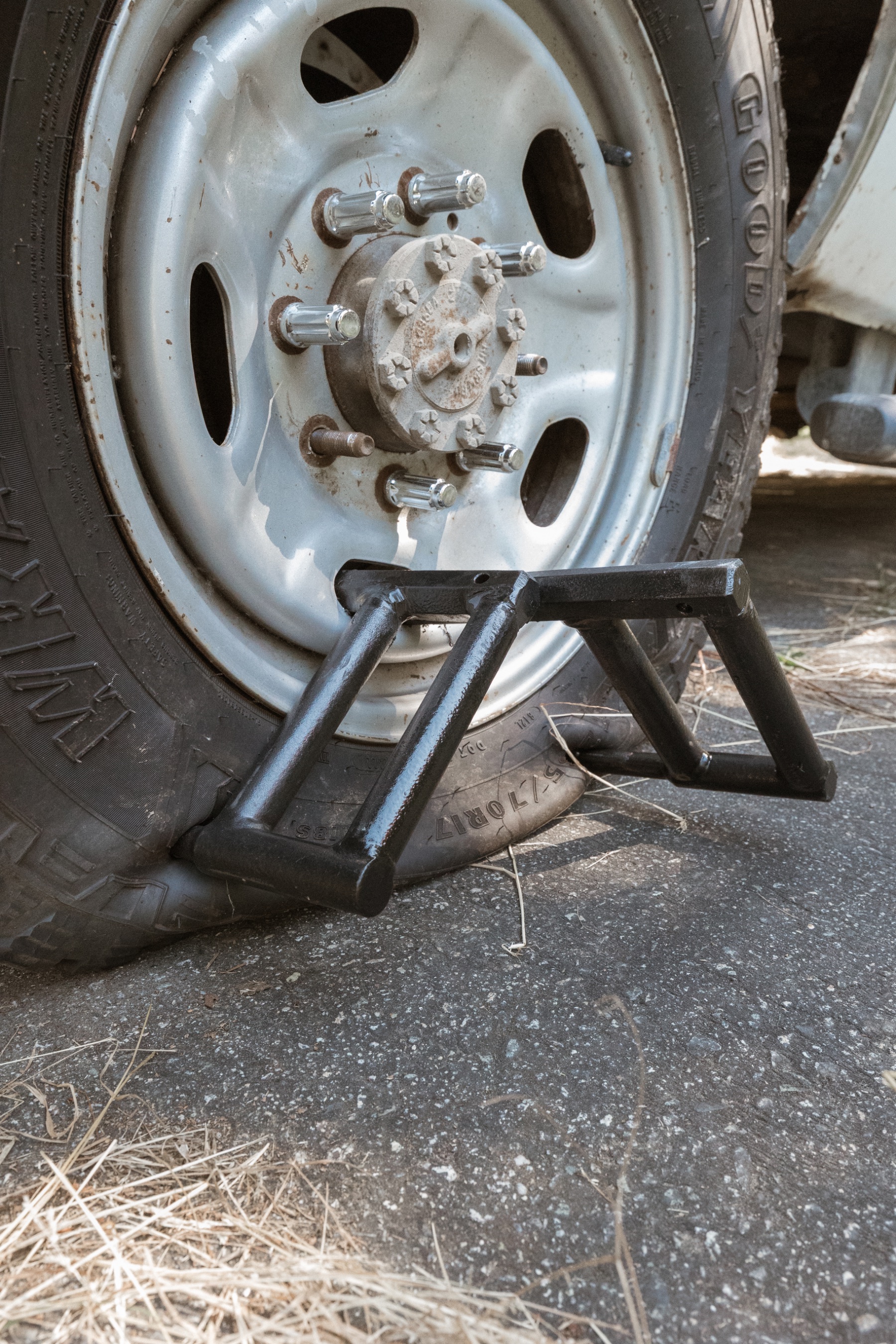 Tool thrust into the tire to puncture it
